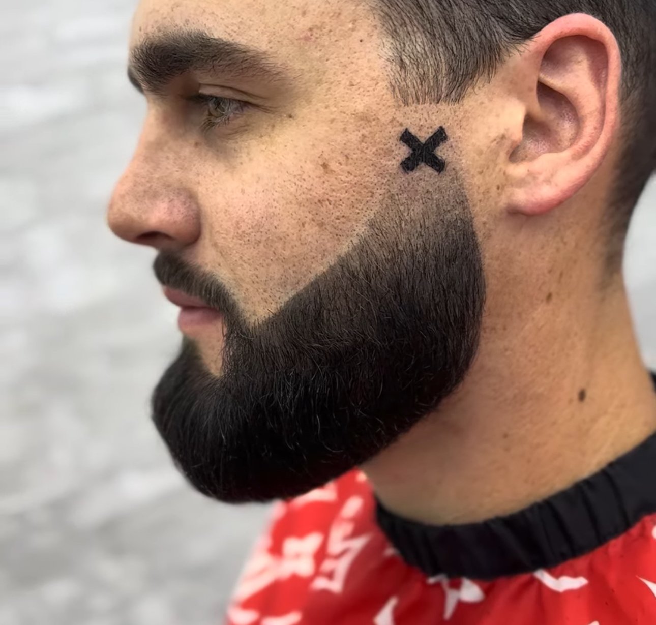 Sharp beard design with X detail by PN Barbershop